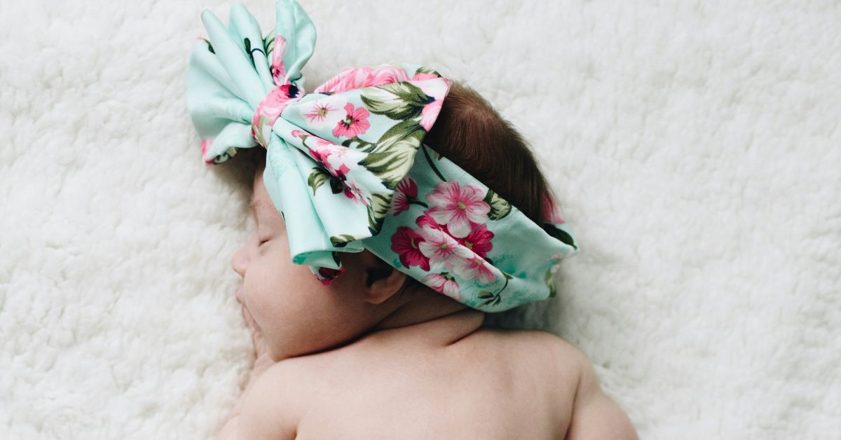 Baby-girl-with-pretty-head-scarf.jpg