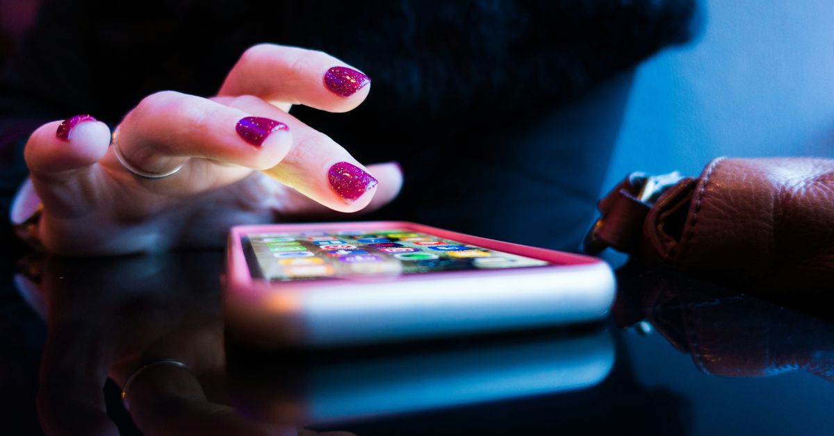 Woman-using-a-mobile-phone-1200-x-628.jpg